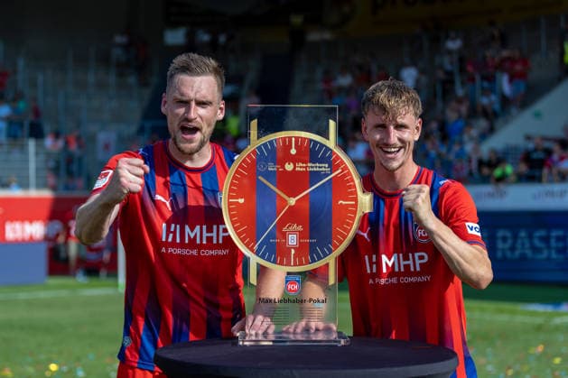 Die Kapitaene Patrick Mainka (1.FC Heidenheim, 06) Jan Schoeppner (1.FC Heidenheim, 03) jubeln mit Pokal nach dem Spiel, GER, 1. FC Heidenheim vs. FC Ingolstadt, Fußball, Max-Liebhaber-Pokal, 2026 2027, 01.08.2026, DFL DFB REGULATIONS PROHIBIT ANY USE OF PHOTOGRAPHS AS IMAGE SEQUENCES AND OR QUASI-VIDEO, GER, 1. FC Heidenheim vs. FC Ingolstadt, Fußball, Max-Liebhaber-Pokal, 2026 2027, 01.08.2026 Heidenheim *** Captains Patrick Mainka of 1 FC Heidenheim, Jan Schoeppner (06) of 1 FC Heidenheim, 03, celebrating with the trophy after the game, GER, 1 FC Heidenheim vs. FC Ingolstadt, soccer, Max Liebhaber Cup, 2026–2027, August 1, 2026, DFL and DFB regulations prohibit any use of photographs as image sequences and or quasi-video, GER, 1 FC Heidenheim vs. FC Ingolstadt, soccer, Max Liebhaber Cup, 2026–2027, August 1, 2026, Heidenheim Copyright: xEibner-Pressefoto JanixPlessx EP_JPL