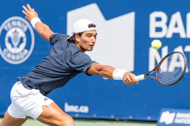 August 1, 2026, Montreal, Quebec, Canada: HENRIQUE ROCHA from Portugal back hand in is match against Martin Damm from USA in qualifying round at Canadian Open at IGA stadium in Montreal, Quebec, Canada on 2026-08-01 Montreal Canada - ZUMAl189 20260801_zsp_l189_010 Copyright: xYannickxLegarex