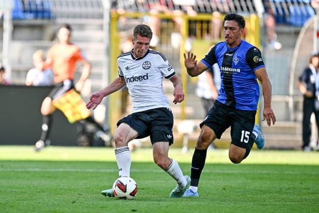 01.08.2026, xfux, Fussball Testspiel, SV Waldhof Mannheim - Eintracht Frankfurt, v.l. Elias Baum (Eintracht Frankfurt), Claudio Kammerknecht (SV Waldhof Mannheim) (DFL DFB REGULATIONS PROHIBIT ANY USE OF PHOTOGRAPHS as IMAGE SEQUENCES and or QUASI-VIDEO) Mannheim *** August 1, 2026, xfux, soccer exhibition match, SV Waldhof Mannheim vs. Eintracht Frankfurt, from left: Elias Baum (Eintracht Frankfurt), Claudio Kammerknecht (SV Waldhof Mannheim). DFL and DFB regulations prohibit any use of photographs as image sequences and or quasi-video. Mannheim