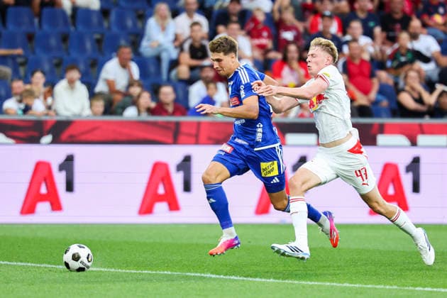 SOCCER - BL, RBS vs Hartberg SALZBURG,AUSTRIA,01.AUG.26 - SOCCER - ADMIRAL Bundesliga, Red Bull Salzburg vs TSV Hartberg. Image shows Marco Hoffmann (Hartberg) and Valentin Zabransky (RBS).  GEPAxpictures xDavidxGeieregger