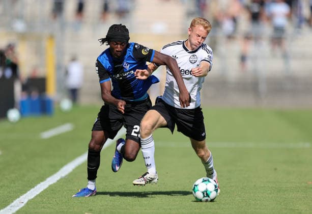 01.08.2026, Fussball Testspiel, SV Waldhof Mannheim - Eintracht Frankfurt, emspor, bespor, sespor, v.l., Jidechi Okeke (SV Waldhof Mannheim), Hugo Larsson (Eintracht Frankfurt) DFL DFB REGULATIONS PROHIBIT ANY USE OF PHOTOGRAPHS AS IMAGE SEQUENCES AND OR QUASI-VIDEO. xdcx *** August 1, 2026, Soccer Friendly Match, SV Waldhof Mannheim vs. Eintracht Frankfurt, emspor, bespor, sespor, v l, Jidechi Okeke (SV Waldhof Mannheim), Hugo Larsson (Eintracht Frankfurt). DFL and DFB regulations prohibit any use of photographs as image sequences and or quasi-video. xdcx Copyright: HMBxMedia Claus
