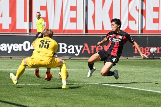 Ibrahim MAZA (LEV) gegen Torwart Felix WIENAND (RWE) Aktion, Zweikampf, Fussball 1. Bundesliga, Testspiel, testmatch, friendly match, Freundschaftsspiel, Bayer Leverkusen (LEV) - Rot Weiss Essen am 01.08.2026 in Leverkusen Deutschland. DFL regulations prohibit any use of photographs as image sequences and or quasi-video Â *** Ibrahim MAZA LEV vs. Goalkeeper Felix WIENAND RWE Action, Tackle, Soccer, Bundesliga 1, Friendly Match, Bayer Leverkusen (LEV) vs. Rot-Weiss Essen on August 1, 2026, in Leverkusen, Germany. DFL regulations prohibit any use of photographs as image sequences and or quasi-video.