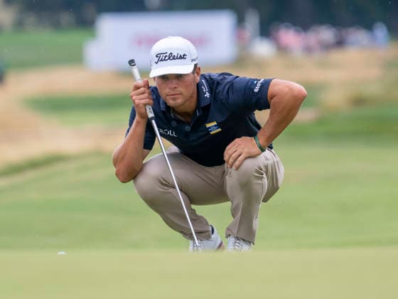 DETROIT, MI - AUGUST 01: Michael Brennan (USA) prepares to putt the ball during the third round of the Rocket Classic at Detroit Golf Club on August 01, 2026, in Detroit, Michigan. (Photo by Joseph Weiser Icon Sportswire) GOLF: AUG 01 PGA, Golf Herren Rocket Classic EDITORIAL USE ONLY Icon2608010823