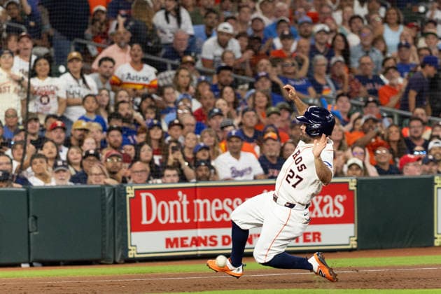 August 1, 2026, Houston, Texas, USA: Houston Astros second baseman JOSE ALTUVE (27) dives for third base in the bottom of the second inning of a Major League Baseball game between the Texas Rangers and the Houston Astros, August 1, 2026, at Daikin Park in Houston, Texas. Houston USA - ZUMAg287 20260801_zsp_g287_008 Copyright: xMatthewxGuzmanx