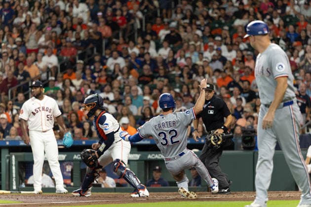 August 1, 2026, Houston, Texas, USA: Texas Rangers outfielder EVAN CARTER (32) slides for home in the top of the fourth inning of a Major League Baseball game between the Texas Rangers and the Houston Astros, August 1, 2026, at Daikin Park in Houston, Texas. Houston USA - ZUMAg287 20260801_zsp_g287_038 Copyright: xMatthewxGuzmanx