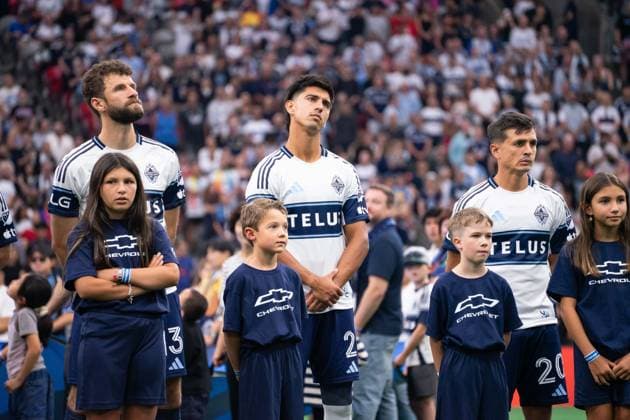 VANCOUVER, CANADA - AUGUST 1: Thomas Muller of Vancouver Whitecaps FC, Mathias Laborda of Vancouver Whitecaps FC and Andres Cubas of Vancouver Whitecaps FC stand during national anthems before the Major League Soccer match between Vancouver Whitecaps FC and Los Angeles FC at BC Place Stadium on August 1, 2026 in Vancouver, British Columbia, Canada.  Copyright: xAmyxElle SPPx Sportspressphoto_SPR199337