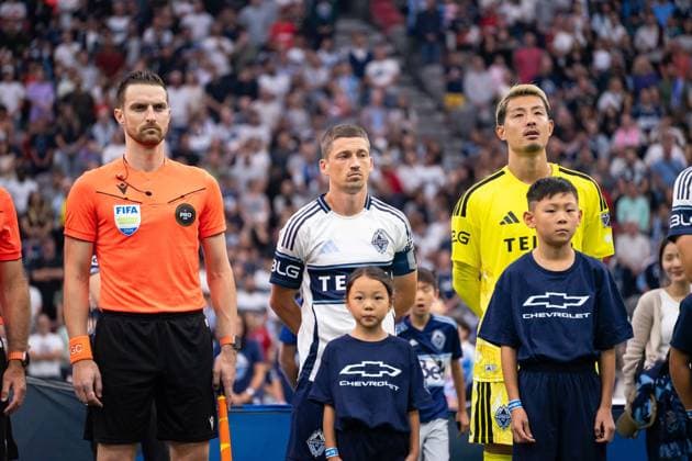 VANCOUVER, CANADA - AUGUST 1: Ryan Gauld of Vancouver Whitecaps FC and Yohei Takaoka of Vancouver Whitecaps FC stand during national anthems before the Major League Soccer match between Vancouver Whitecaps FC and Los Angeles FC at BC Place Stadium on August 1, 2026 in Vancouver, British Columbia, Canada.  Copyright: xAmyxElle SPPx Sportspressphoto_SPR199339