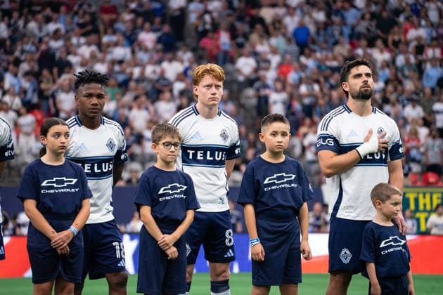 VANCOUVER, CANADA - AUGUST 1: Edier Ocampo of Vancouver Whitecaps FC, Oliver Larraz of Vancouver Whitecaps FC and Brian White of Vancouver Whitecaps FC stand during national anthems before the Major League Soccer match between Vancouver Whitecaps FC and Los Angeles FC at BC Place Stadium on August 1, 2026 in Vancouver, British Columbia, Canada.  Copyright: xAmyxElle SPPx Sportspressphoto_SPR199340