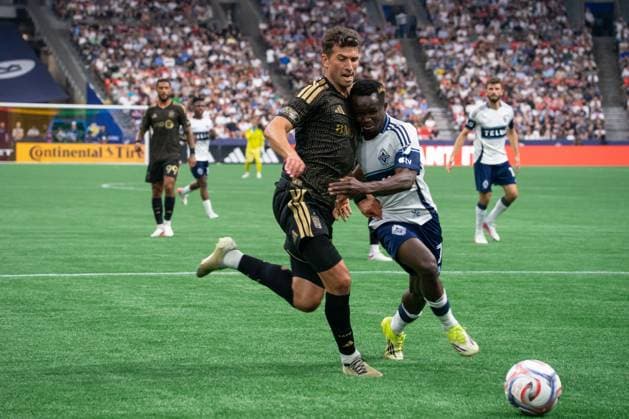 VANCOUVER, CANADA - AUGUST 1: Yevhen Cheberko of Los Angeles FC and Cheikh Sabaly of Vancouver Whitecaps FC battles for the ball during the Major League Soccer match between Vancouver Whitecaps FC and Los Angeles FC at BC Place Stadium on August 1, 2026 in Vancouver, British Columbia, Canada.  Copyright: xAmyxElle SPPx Sportspressphoto_SPR199388
