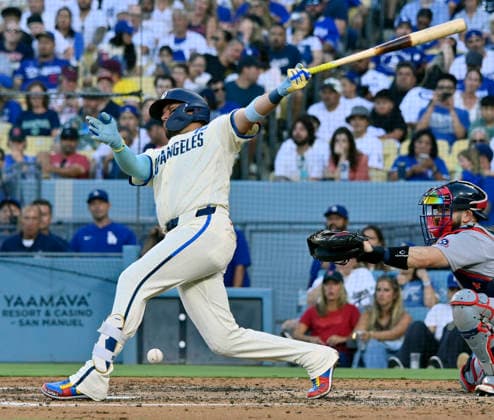 Los Angeles Dodgers shortstop Moguel Rojas reacts after hitting the ball off his leg in the fourth inning at Dodger Stadium against the Boston Red Sox in Los Angeles on Saturday, August 1, 2026.  LAP2026080115 JIMxRUYMEN