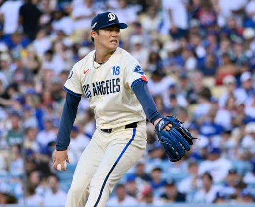 Los Angeles Dodgers starting pitcher Yoshinobu Yamamoto winds up to deliver in the fourth inning at Dodger Stadium against the Boston Red Sox in Los Angeles on Saturday, August 1, 2026.  LAP2026080117 JIMxRUYMEN