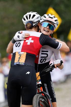 02.08.2026, Monteceneri, Monte Ceneri, 2026 UEC MTB European Championship, EM, Europameisterschaft XCO Women U23 s Final (cross country olympic) Anina Hutter 7 (SUI) winner of the race congratulating Fiona Schibler 2 (SUI) arriving in second position Monteceneri Monte Ceneri Ticino Switzerland *** August 2, 2026, Monteceneri, Monte Ceneri, 2026 UEC MTB European Championship XCO Women U23 Final, cross-country Olympic, Anina Hutter (7, SUI), winner of the race, congratulating Fiona Schibler (2, SUI), who finished in second place, Monteceneri, Monte Ceneri, Ticino, Switzerland Copyright: xJustPictures.ch FrancescoxMinghettix jp-en-FrMi-_NG_0987