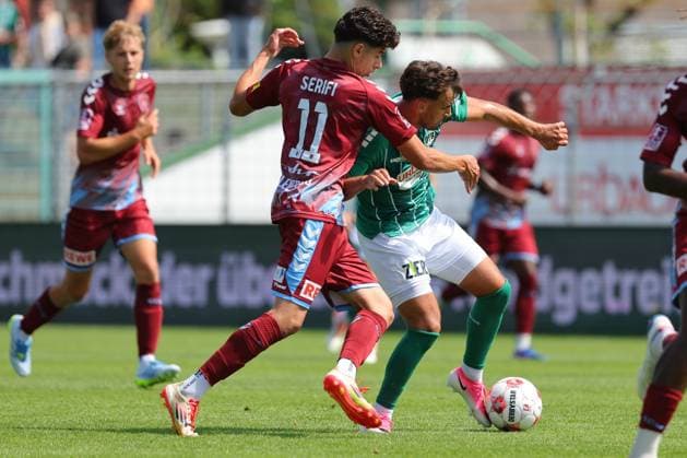 01.08.26, GER, Regionalliga Nord, Fussball, 1. Spieltag, Saison 2026 2027, Dietmar-Scholze-Stadion an der Lohmuehle, VfB Luebeck vs SC Weiche Flensburg Ilir Serifi (SC Weiche Flensburg 08 11) im Zweikampf gegen Dardan Karimani (VfB Luebeck 10) Foto nordphoto GmbH Tauchnitz Luebeck Dietmar-Scholze-Stadion an der Lohmuehle SH Germany *** August 26, 2001, Germany, Regionalliga Nord, Soccer, Matchday 1, 2026–2027 Season, Dietmar Scholze Stadium an der Lohmuehle, VfB Lübeck vs. SC Weiche Flensburg Ilir Serifi SC Weiche Flensburg 08 11 in a tackle against Dardan Karimani VfB Lübeck 10 Photo: nordphoto GmbH Tauchnitz Lübeck Dietmar Scholze Stadium an der Lohmühle SH Germany Copyright: xnordphotoxGmbHx xTauchnitzx