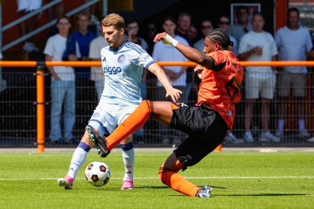 VOLENDAM , 13-02-2026 , Kras Stadium, season 2026 2027 , Pre season footbal . Match between FC Volendam and Ajax . Picture shows Ajax player Anton Gaaei and FC Volendam player JaÃ¯r Haakmat Volendam - Ajax (friendly  x205403135x Copyright: