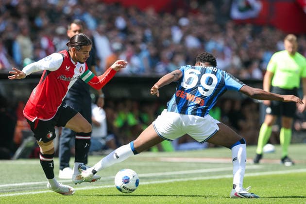 2026-08-02 Feyenoord v Atalanta Bergamo - Pre Season Friendly ROTTERDAM, NETHERLANDS - AUGUST 2: Anis Hadj Moussa of Feyenoord is challenged by Honest Ahanor of Atalanta Bergamo during the Pre Season Friendly match between Feyenoord and Atalanta Bergamo at Stadion Feijenoord on August 2, 2026 in Rotterdam, Netherlands. Rotterdam Stadion Feijenoord Netherlands Content not available for redistribution in The Netherlands directly or indirectly through any third parties. Copyright: xHansxvanxderxValkx