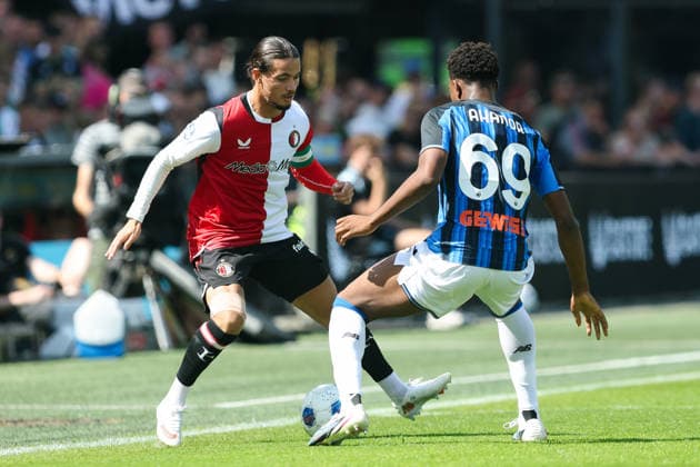 2026-08-02 Feyenoord v Atalanta Bergamo - Pre Season Friendly ROTTERDAM, NETHERLANDS - AUGUST 2: Anis Hadj Moussa of Feyenoord is challenged by Honest Ahanor of Atalanta Bergamo during the Pre Season Friendly match between Feyenoord and Atalanta Bergamo at Stadion Feijenoord on August 2, 2026 in Rotterdam, Netherlands. Rotterdam Stadion Feijenoord Netherlands Content not available for redistribution in The Netherlands directly or indirectly through any third parties. Copyright: xHansxvanxderxValkx