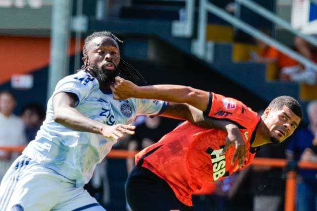 VOLENDAM , 13-02-2026 , Kras Stadium, season 2026 2027 , Pre season footbal . Match between FC Volendam and Ajax . Picture shows Ajax player Tolu Arokadare and FC Volendam player Mawouna Amevor Volendam - Ajax (friendly  x205404965x Copyright: