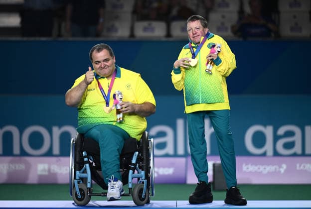 COM26 BOWLS, Gold medalists Damien Delgado and James Reynolds of Australia celebrate during the medal ceremony for the Para Mens Pairs B6-B8 Gold Medal match between Australia and New Zealand during the Glasgow 2026 Commonwealth Games at SEC Centre Hall 3 in Glasgow, Scotland, Sunday, August 2, 2026. ( NO ARCHIVING, EDITORIAL USE ONLY Glasgow Scotland United Kingdom  Copyright: xJOELxCARRETTx 20260803199612030276
