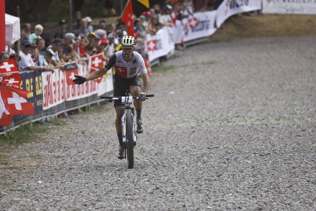 02.08.2026, Monteceneri, Monte Ceneri, 2026 UEC MTB European Championship, EM, Europameisterschaft XCO Men Elite s Final (cross country olympic) Filippo Colombo 17 (SUI) asking some noise from the fans for the last lap Monteceneri Monte Ceneri Ticino Switzerland *** August 2, 2026, Monteceneri, Monte Ceneri, 2026 UEC MTB European Championship XCO Men s Elite Final, Cross Country Olympic, Filippo Colombo (17, SUI) urging the fans to cheer him on for the final lap, Monteceneri, Monte Ceneri, Ticino, Switzerland Copyright: xJustPictures.ch FrancescoxMinghettix jp-en-FrMi-_NG_2519