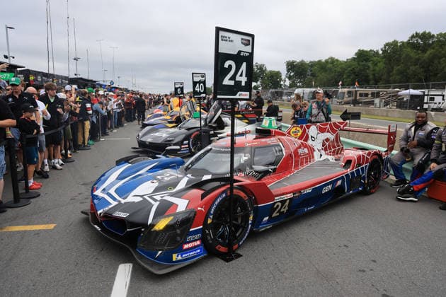 Sheldon van der Linde (RSA) und Dries Vanthoor (BEL) BMW M Hybrid V8 24 in Super-Man Brand New Day Livery in der Startaufstellung vor dem Rennen, BMW M Team WRT, 02.082026, Strecke Road America in Elkart Lake, Wisconsin, USA, Hypercar der IMSA Rennserie *** Sheldon van der Linde (RSA) and Dries Vanthoor (BEL) in the BMW M Hybrid V8 24 with the Super Man Brand New Day livery on the starting grid before the race, BMW M Team WRT, August 2, 2026, Road America circuit in Elkart Lake, Wisconsin, USA, IMSA Hypercar series