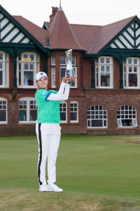 LYTHAM, ENGLAND - AUGUST 2: Winner, Shiho Kuwaki (JPN) holds the AIG British Women™s Open Trophy after Round 4 at the 50th AIG Women™s Open Championship at the Royal Lytham and St Anne™s Golf Club, Lytham on August 2, 2026 in Lancashire, England The 50th AIG Women™s Open Championship