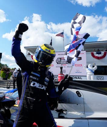 August 2, 2026, Elkhart Lake, Wisconsin, USA: Filipe Albuquerque, co-driver of the 10 Wayne Taylor Racing Cadillac GTP, celebrates in Victory Lane at the IMSA 6 hour sportscar race at Road America. Elkhart Lake USA - ZUMAd212 20260802_zsp_d212_025 Copyright: xRichardxDolex