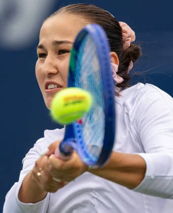 (260803) -- TORONTO, Aug. 3, 2026 -- Kamilla Rakhimova of Uzbekistan returns the ball during the first round of the women s singles match between Kamilla Rakhimova of Uzbekistan and Venus Williams of the United States at the 2026 National Bank Open tennis tournament in Toronto, Canada, Aug. 2, 2026. (Photo by Xinhua) (SP)CANADA-TORONTO-TENNIS-NATIONAL BANK OPEN-WOMEN S SINGLES ZouxZheng 
