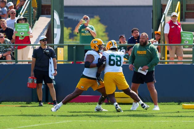 Green Bay Packers Training Camp 2026 Dillon Wade 68 of the Green Bay Packers engages in a blocking drill with a teammate during training camp at Ray Nitschke Field in Ashwaubenon, Wisconsin, on August 2, 2026. Ashwaubenon Wisconsin United States  Copyright: xRossxHarriedx originalFilename:harried-greenbay260802_npnDz.jpg