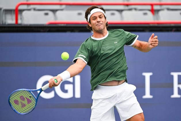 MONTREAL, QC - AUGUST 03: Alexis Galarneau (CAN) returns the ball during a first round match at National Bank Open on August 03, 2026 at IGA Stadium in Montreal, QC (Photo by David Kirouac Icon Sportswire) TENNIS: AUG 03 National Bank Open EDITORIAL USE ONLY Icon26080301226