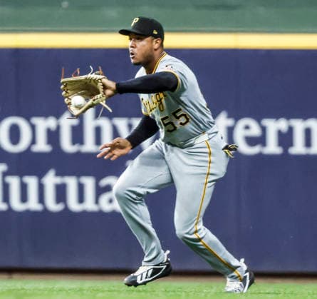 Pittsburgh Pirates right fielder Esmerlyn Valdez hits a ball hit by Milwaukee Brewers first baseman Andrew Vaughn in the sixth inning of the MLB, Baseball Herren, USA game between the Pittsburgh Pirates and the Milwaukee Brewers at American Family Field in Milwaukee, Wisconsin on Monday, August 3, 2026.  MIL20260803822 TANNENxMAURY