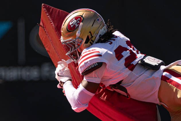 NFL, American Football Herren, USA San Francisco 49ers Training Camp Aug 3, 2026; Santa Clara, California, USA; San Francisco 49ers cornerback Upton Stout (20) tackles a training pad during Training Camp at the SAP Performance Center next to Levi™s Stadium. Mandatory Credit: Stan Szeto - Image of Santa Clara California USA EDITORIAL USE ONLY Copyright: xStanxSzetox StanxSzetox iosphotos416924