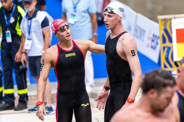 SWIMMING - EAC 2026 PARIS,FRANCE,04.AUG.26 - SWIMMING - European Aquatics Championships Paris 2026, open water, 10km, men. Image shows Luca Karl (AUT) and Florian Wellbrock (GER).  GEPAxpictures xPhilippxBrem