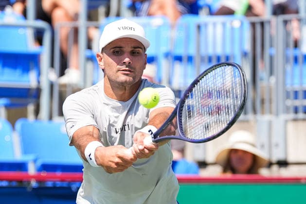 MONTREAL, QC - AUGUST 04: Marcos Giron (USA) returns the ball during a first round match at National Bank Open on August 04, 2026 at IGA Stadium in Montreal, QC (Photo by David Kirouac Icon Sportswire) TENNIS: AUG 04 National Bank Open EDITORIAL USE ONLY Icon26080401026