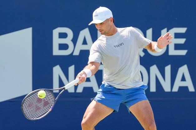 MONTREAL, QC - AUGUST 04: Marcos Giron (USA) returns the ball during a first round match at National Bank Open on August 04, 2026 at IGA Stadium in Montreal, QC (Photo by David Kirouac Icon Sportswire) TENNIS: AUG 04 National Bank Open EDITORIAL USE ONLY Icon26080402526