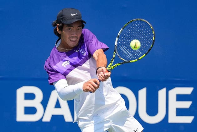 MONTREAL, QC - AUGUST 04: Duncan Chan (CAN) returns the ball during a first round match at National Bank Open on August 04, 2026 at IGA Stadium in Montreal, QC (Photo by David Kirouac Icon Sportswire) TENNIS: AUG 04 National Bank Open EDITORIAL USE ONLY Icon26080402926