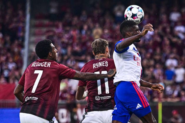 From left Josimar Alcocer and Matej Rynes of Sparta and Clinton Mata of Lyon in action during the 1st leg, 3rd qualifying round match of the Football Champions League between Sparta Praha and Olympique Lyon, on August 4, 2026, in Prague, Czech Republic. (CTKxPhoto OndrejxDeml) CTKPhotoP2026080406508  CTKPhotoP2026080406508