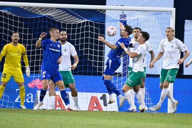 Croatia, Zagreb, 040826. Maksimir Stadium. Football match of the third round of UEFA Champions League qualification, GNK Dinamo - FK Kauno Zalgiris. In the photo: Luka Stojkovic, Anton Tolordava, Miha Zajc. Photo: Goran Mehkek CROPIX Zagreb Croatia Copyright: xxGoranxMehkekx gm_dinamo_kauno29-040826