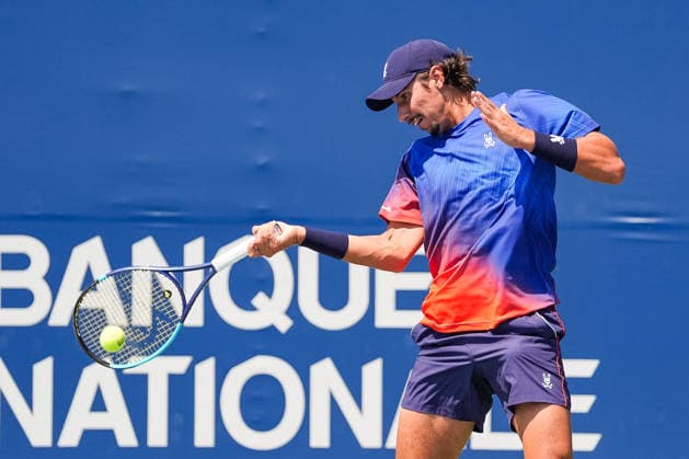 MONTREAL, QC - AUGUST 04: Alexei Popyrin (AUS) returns the ball during a first round match at National Bank Open on August 04, 2026 at IGA Stadium in Montreal, QC (Photo by David Kirouac Icon Sportswire) TENNIS: AUG 04 National Bank Open EDITORIAL USE ONLY Icon26080405326