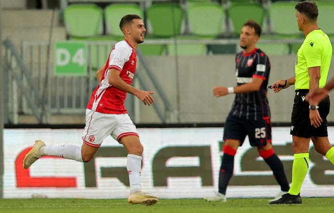 Crvena Zvezda v Hapoel Beer Sheva, UEFA Champions League third qualifying round, first leg, Season 2026 2027 Szombathely, Hungary. 4th August, 2026. Hapoel s Zahi Ahmad celebrates goal during the UEFA Champions League third qualifying round, first leg football match between Crvena Zvezda (Red Star) and Hapoel Be er Sheva at the Haladas Stadium on August 4, 2026 in Szombathely, Hungary. Szombathely Hungary Copyright: xPedjaxMilosavljevicx x