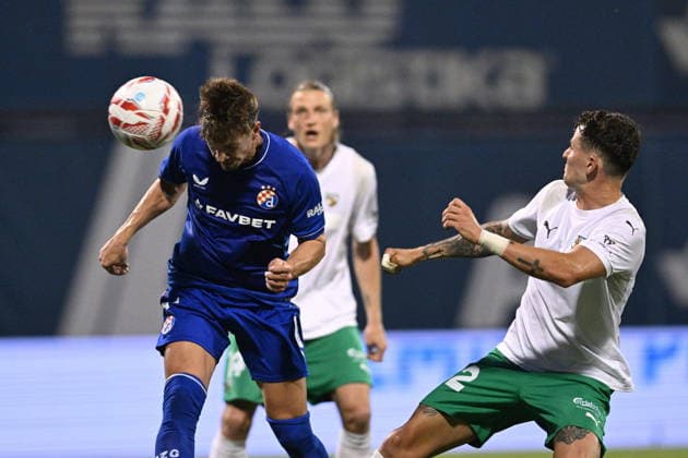 Zagreb, 040826. Maksimir Stadium. Football match of the third round of UEFA Champions League qualification, GNK Dinamo - FK Kauno Zalgiris. In the photo: Miha Zajc, Franco Baldessarra. Photo: Damir Krajac CROPIX Copyright: xxDamirxKrajacx dk_dinamo_kauno56-040826