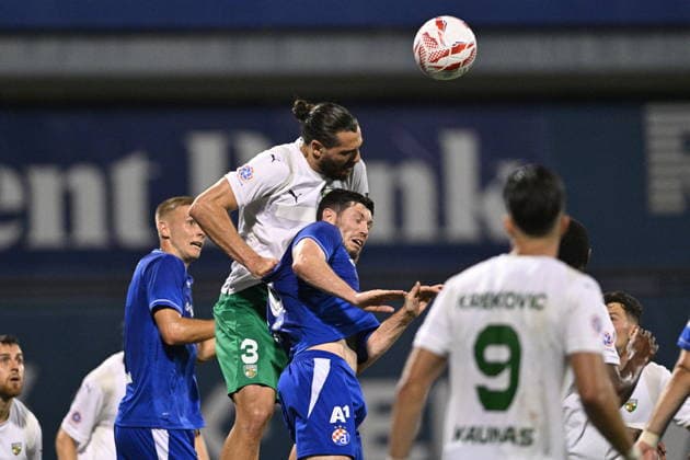 Zagreb, 040826. Maksimir Stadium. Football match of the third round of UEFA Champions League qualification, GNK Dinamo - FK Kauno Zalgiris. In the photo: Anton Tolordava, Scott McKenna. Photo: Damir Krajac CROPIX Copyright: xxDamirxKrajacx dk_dinamo_kauno58-040826