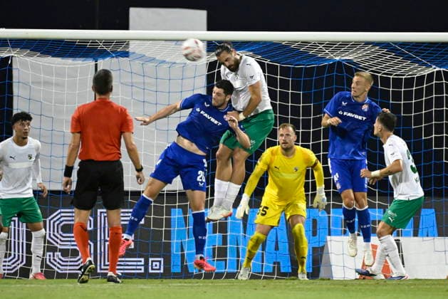 Croatia, Zagreb, 040826. Maksimir Stadium. Football match of the third round of UEFA Champions League qualification, GNK Dinamo - FK Kauno Zalgiris. In the photo: Scott McKenna, Anton Tolordava. Photo: Goran Mehkek CROPIX Zagreb Croatia Copyright: xxGoranxMehkekx gm_dinamo_kauno44-040826