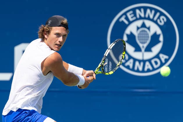 August 4, 2026, Montreal, Quebec, Canada: LIAM DRAXL from Canada backhand in match against Daniel Merida from Spain in first round at Canadian Open at IGA stadium in Montreal, Quebec, Canada on 2026-08-04 Montreal Canada - ZUMAl189 20260804_zsp_l189_036 Copyright: xYannickxLegarex