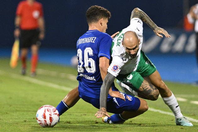 Croatia, Zagreb, 040826. Maksimir Stadium. Football match of the third round of UEFA Champions League qualification, GNK Dinamo - FK Kauno Zalgiris. In the photo: Sergi Dominguez, Anthony Kalik. Photo: Damir Krajac CROPIX Copyright: xxDamirxKrajacx dk_dinamo_kauno66-040826