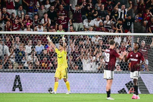 Goalkeeper Jakub Surovcik of Sparta, left, celebrates after winning the 1st leg, 3rd qualifying round match of the Football Champions League between Sparta Praha and Olympique Lyon, on August 4, 2026, in Prague, Czech Republic. (CTKxPhoto OndrejxDeml) CTKPhotoP2026080407182  CTKPhotoP2026080407182