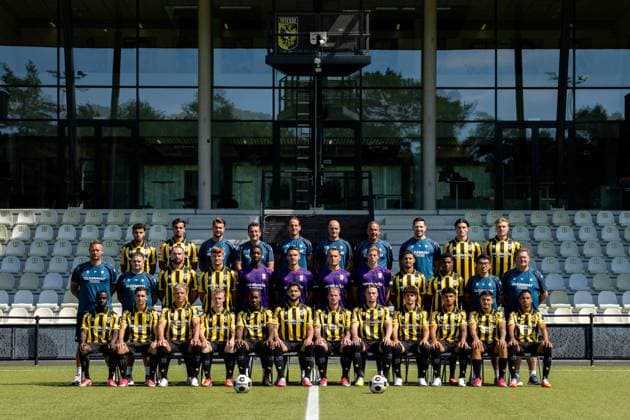 ARNHEM , 04-08-2026 , Nationaal Sportcentrum Papendal , season 2026 2027 , Dutch Keuken Kampioen Divisie football , Photocall , picture shows Vitesse squad with, back row L-R, Vitesse player Ayman Sellouf, Vitesse player Omar Achouitar, Vitesse performance coach Lars Smeenk, Vitesse assistant coach Timm Fahrion, Vitesse head coach Rudiger Rehm, Vitesse assistant coach Mike van Dijk, Vitesse goalkeeper coach Rein Baart, Vitesse physiotherapist Tijmen Gores, Vitesse player Koen te Veluwe, Vitesse player Eduard Probst, middle row L-R, Vitesse team manager Erwin Mulder, Vitesse kit manager Fabian van Drumpt, Vitesse player Valon Zumberi, Vitesse player Marcus Steffen, Vitesse goalkeeper Tyrick Bodak, Vitesse goalkeeper Connor van den Berg, Vitesse goalkeeper Maximilian Brull, Vitesse goalkeeper Jayden Siecker, Vitesse player Naoufal Bannis, Vitesse player Nathan Markelo, Vitesse video analyst Yuhao Zhang, Vitesse kit manager Leon Keijman, front row L-R, Vitesse player Solomon Bonnah, Vitesse player Youssef Ouallil, Vitesse player Chiel Olde Keizer, Vitesse player Mathijs Marschalk, Vitesse player Joao Pinto, Vitesse player Marco Schikora, Vitesse player Alexander Buttner, Vitesse player Nino Zonneveld, Vitesse player Yuval Ranon, Vitesse player Ricardo Schwarz, Vitesse player Filipe de Carvalho and Vitesse player Xiamaro Thenu pose for a teamphoto Photocall Vitesse  x205454201x Copyright: