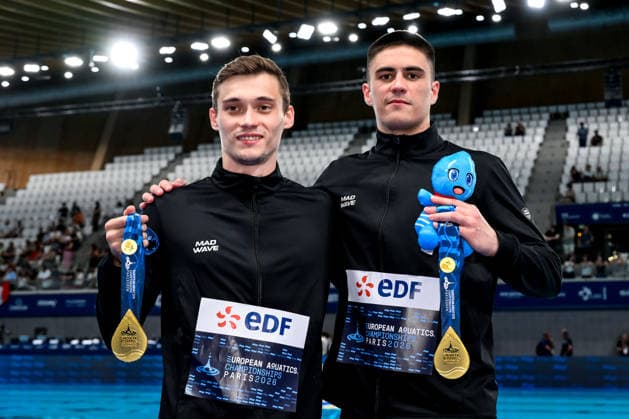 Nikita Shleikher, Ruslan Ternovoi Neutral Athletes B show the gold medal after competing in the diving 10m Platform Synchro Men Final during the European Aquatics Championships at the Olympic Aquatic Center in Paris (France), August 4, 2026. Andrea Staccioli