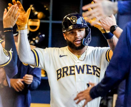 Milwaukee Brewers left fielder Jackson Chourio celebrates in the dugout after hitting a home run in the third inning of the MLB, Baseball Herren, USA game between the Pittsburgh Pirates and the Milwaukee Brewers at American Family Field in Milwaukee, Wisconsin on Tuesday, August 4, 2026.  MIL20260804813 TANNENxMAURY