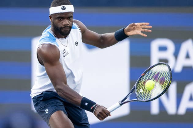 MONTREAL, QC - AUGUST 04: Frances Tiafoe from USA plays a backhand against Marin Cilic from Croatia during their singles second round match on day three of the ATP, Tennis Herren 1000 National Bank Open presented by Rogers at Stade IGA on August 4, 2026 in Montreal, Quebec, Canada. (Photo by Vincent Ethier Icon Sportswire) TENNIS: AUG 04 National Bank Open EDITORIAL USE ONLY Icon270804015