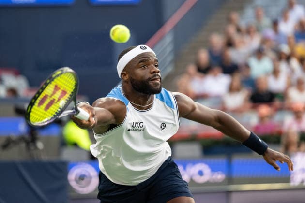 MONTREAL, QC - AUGUST 04: Frances Tiafoe from USA returns the ball against Marin Cilic from Croatia during their singles second round match on day three of the ATP, Tennis Herren 1000 National Bank Open presented by Rogers at Stade IGA on August 4, 2026 in Montreal, Quebec, Canada. (Photo by Vincent Ethier Icon Sportswire) TENNIS: AUG 04 National Bank Open EDITORIAL USE ONLY Icon270804027
